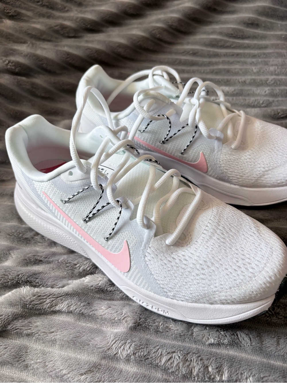 Nike Women's White Running Sneakers with Pink Swoosh